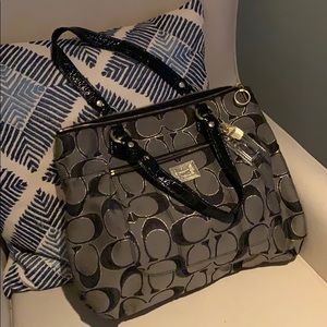 Black and gold Coach purse